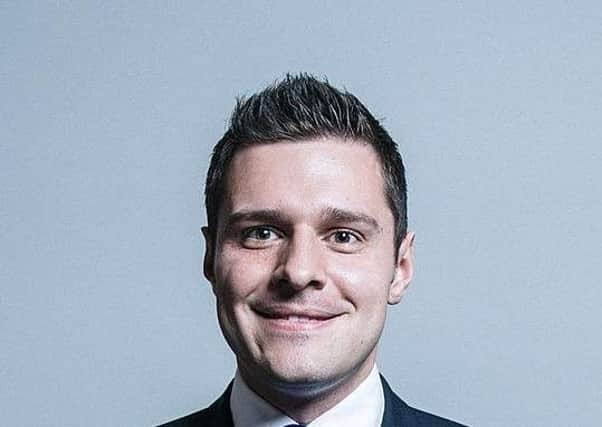 Ross Thomson.