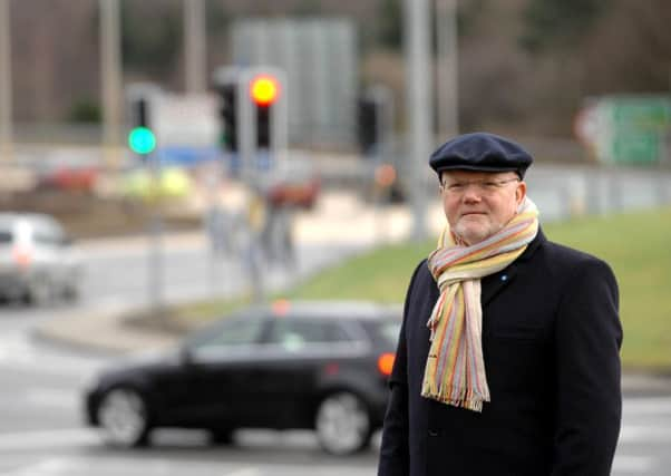 Midlothian North MSP Colin Beattie, pictured at Sheriffhall Roundabout, where major improvement works are due