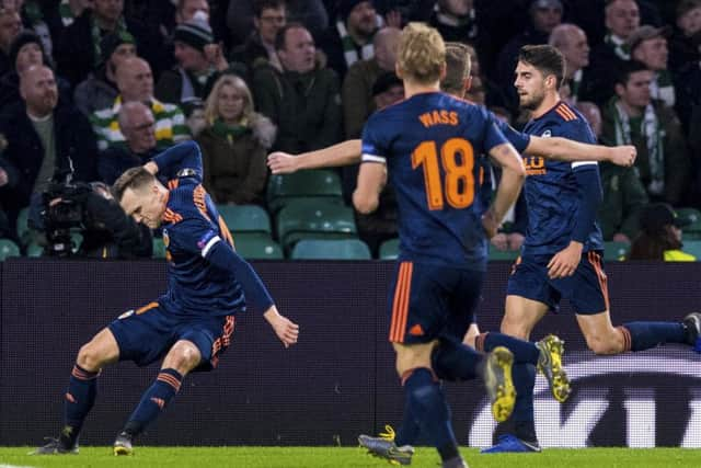 Denis Cheryshev celebrates the goal which put Valencia ahead at Celtic Park. Picture: SNS/Alan Harvey