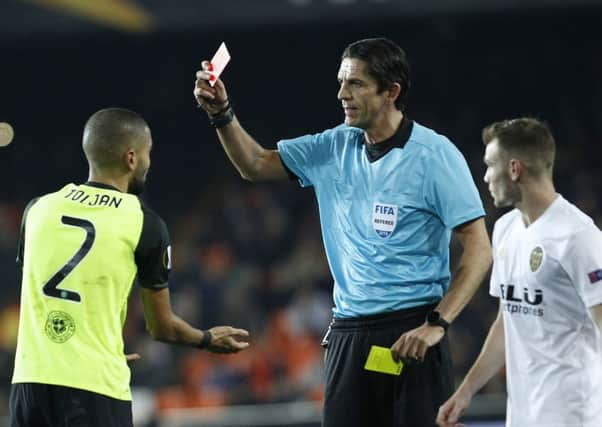 Celtic's Jeremy Toljan is sent off against Valencia. Picture: Alberto Saiz/AP