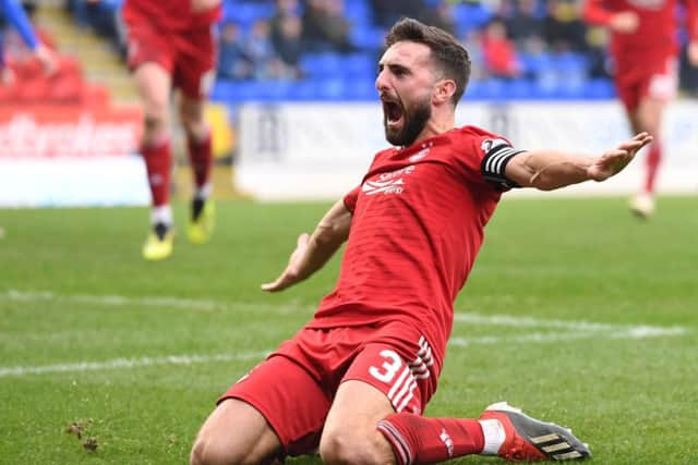 Aberdeen's Graeme Shinnie celebrates. Pic: SNS/Craig Williamson