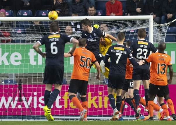 Falkirk's Cieran McKenna heads home the equaliser. Pic: SNS/Craig Foy