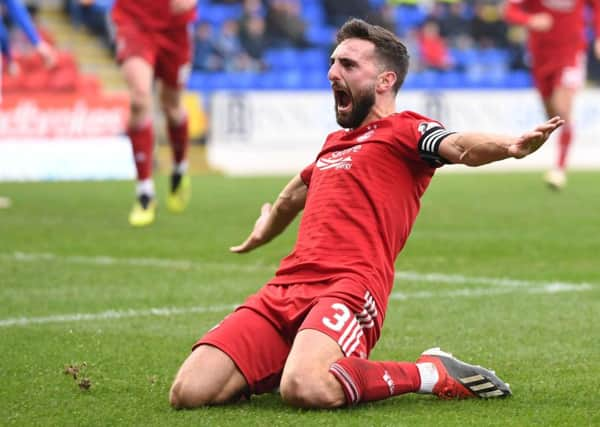 Aberdeens Graeme Shinnie celebrates the second of his two goals against St Johnstone on Saturday.