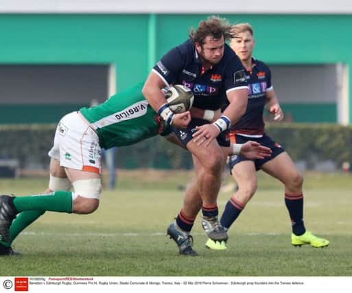 Edinburgh prop Pierre Schoeman  attmpts to burst through the Benetton defence during Saturdays defeat in Treviso. Picture: Fotosport/REX/Shutterstock