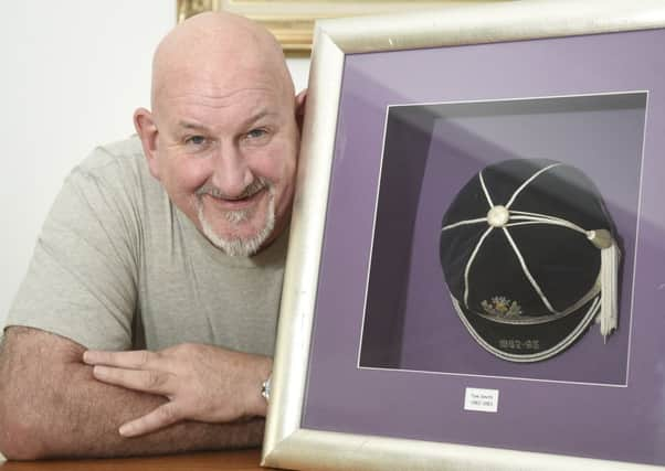 Tom Smith with the Scotland cap he won at Twickenham in 1983.