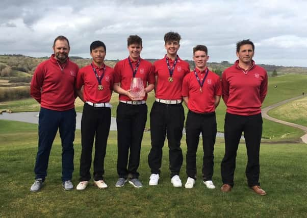 Loretto's trimphant team with head of golf coaching Ian Muir, far left, and director of golf Rick Valentine, far right