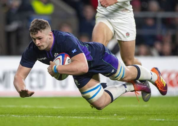 Magnus Bradbury goes over the line for Scotlands third try at Twickenham. Picture: SNS.