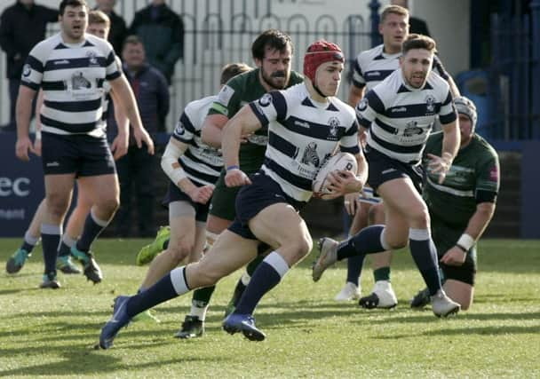 Heriots fullback Jack Blain on hs way to one of his two tries of the afternoon. Picture: Alistair Linford