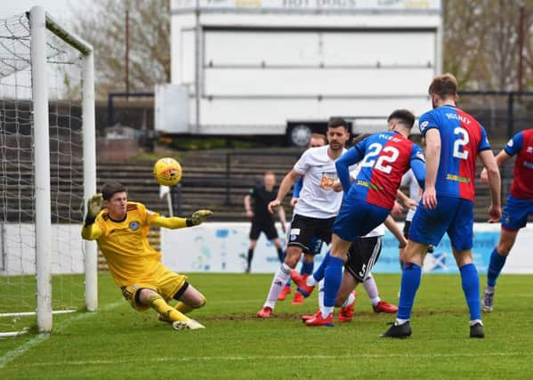 Inverness' Brad Mackay scores the winner. Pic: SNS/Ross MacDonald