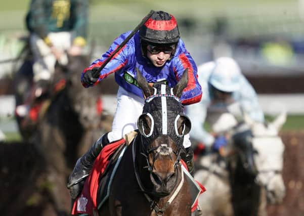 Jerry McGrath and Beware The Bear clear the last to win the Ultima Handicap Chase at Cheltenham. Picture: Alan Crowhurst/Getty Images