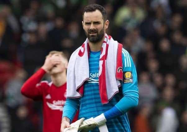 Aberdeen keeper 
Joe Lewis walks off the Hampden pitch. Picture: Alan Harvey/SNS