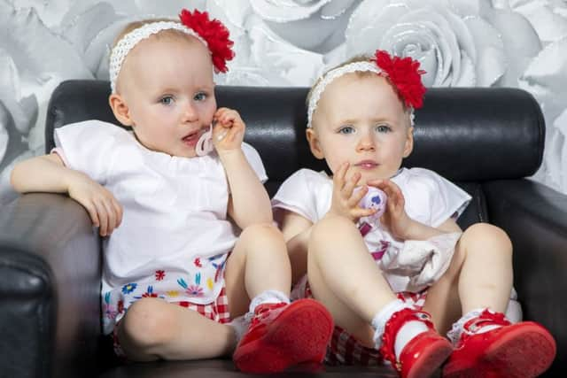 Twin girls (L-R) Lillie and Lacie Ferguson. Picture: SWNS