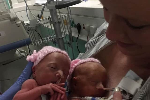 Nicky Ferguson from Edinburgh with her two-year-old twin girls Lillie and Lacie. Picture: SWNS