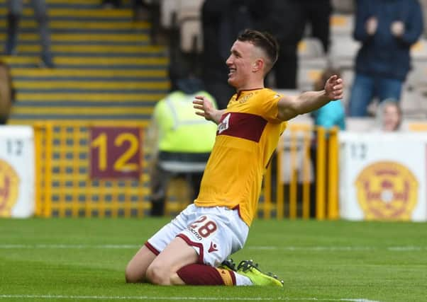 Motherwell's David Turnbull celebrates his opener. Pic: SNS/Craig Foy