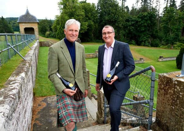 Joe Gibbs of Belladrum Festival (left) with Alasdair Fowle of the Co-op. Picture: contributed.