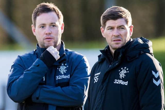 Michael Beale (left) with Steven Gerrard. Picture: SNS Group