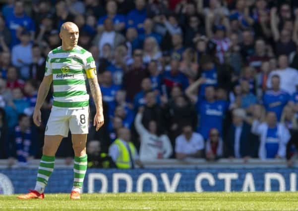 Scott Brown looks on as Rangers double their lead. Picture: SNS Group