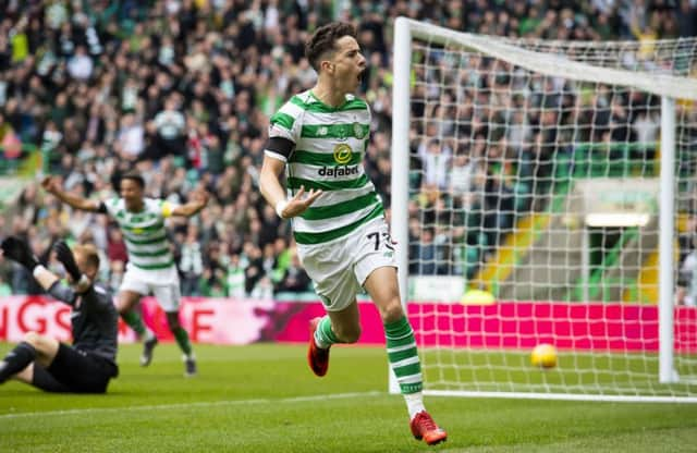 Celtic's Mikey Johnston celebrates his opening goal. Pic: SNS/Alan Harvey