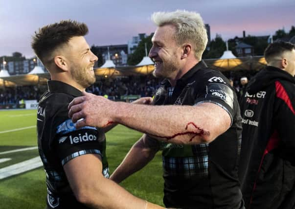 Ali Price, left, and Stuart Hogg enjoy the moment following Glasgows victory over Ulster. Picture: SNS/SRU.