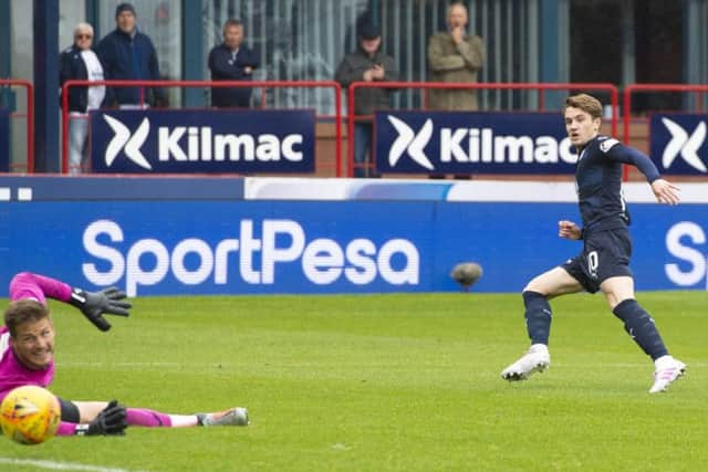 Scott Wright, right, nets for Dundee during their defeat against St Mirren on Saturday. Picture: SNS