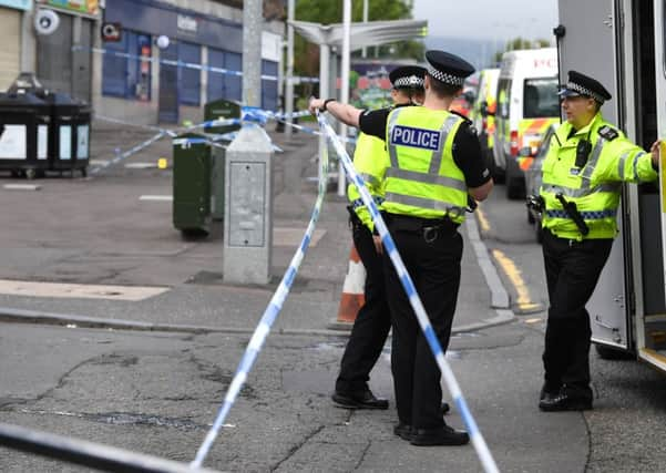 Police closed off the scene in Radnor Street. Picture: John Devlin