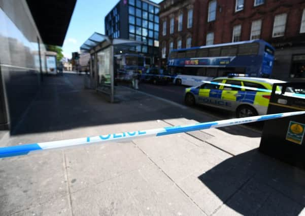 Renfrew Lane in Glasgow was sealed off as police probed the alleged rape of a teenage girl. Picture: John Devlin