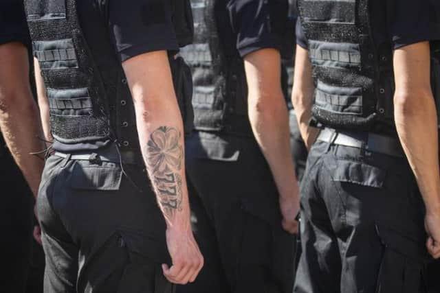 Some tattoos are not acceptable for police officers in Scotland