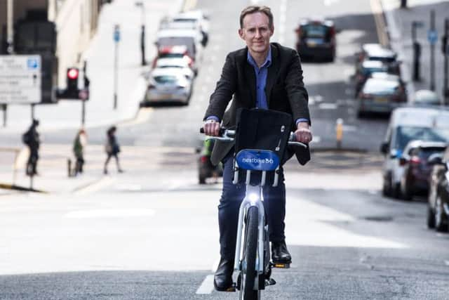 The bike struggled a bit up steep Montrose Street beside Strathclyde University. Picture: John Devlin