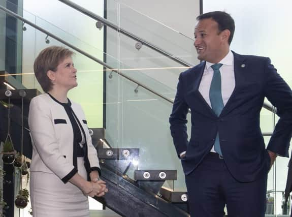 Leo Varadkar and Nicola Sturgeon speak after the British Irish Council summit meeting in Manchester