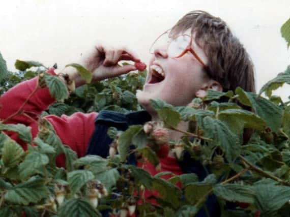 Picking strawberries and raspberries shaped the summers of thousands of Scots who took to the fields of the fertile east to earn a pound or two. PIC: One Voice Photograph Collection, Blairgowrie.