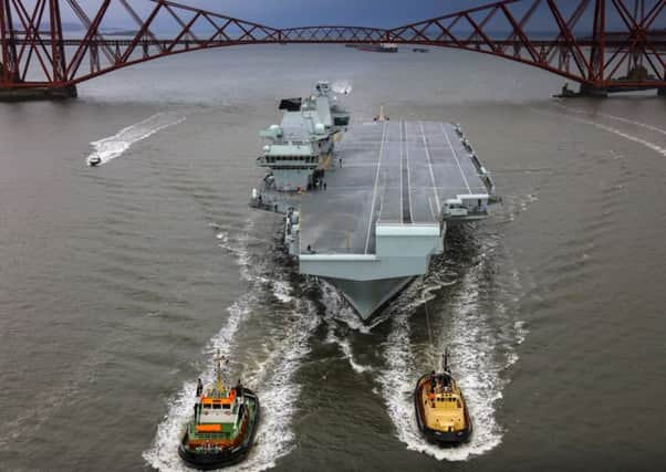 The 65,000-tonne HS Queen Elizabeth is an example of UK military firepower, but cyberwarfare capabilities are increasingly important (Picture: Royal Navy)