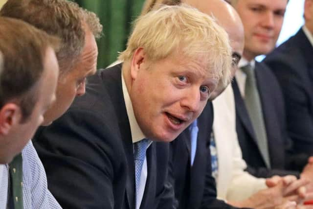 Boris Johnson wrote that Winston Churchill was a glory-chasing goal-mouth-hanging opportunist (Picture: Getty)