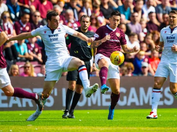 Jamie Walker competes for the ball.