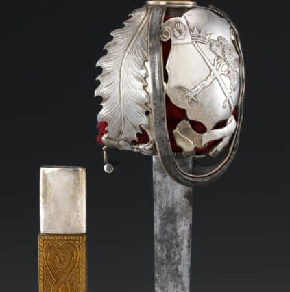 The MacGregor of MacGregor sword that was elaborately refashioned for the occasion to help the clan chief assert his status. PIC: NMS.