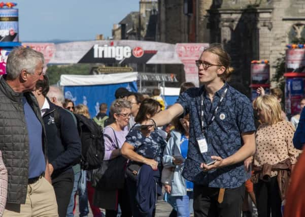 Festival revellers on the Royal Mile. Picture: TSPL