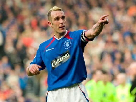 Fernando Ricksen in action for Rangers