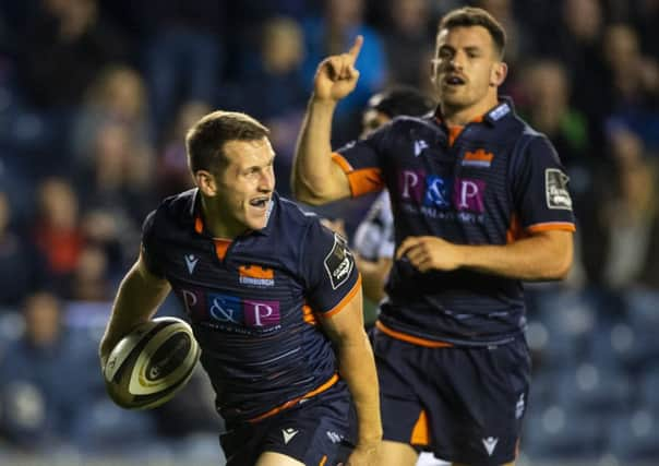 Mark Bennett celebrates the second try of his hat-trick against Zebre. Picture: Bill Murray/SNS