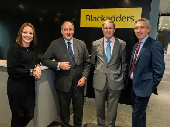 From left: partner Donna Reynolds; managing partner Johnston Clark; chairman and partner Scott Williamson; and partner Fraser Hardie. Picture: Chris Watt Photography.