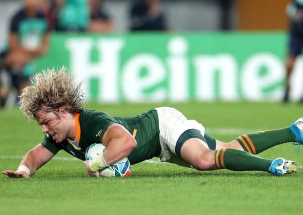 Scrum-half Faf De Klerk scores for South Africa in the 26-3 victory over Japan.