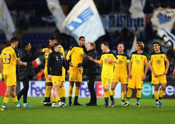 Neil Lennon celebrates with his players following their victory over Lazio in Rome. Picture: Getty