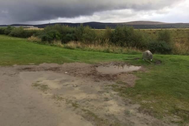 The Clan Fraser stone before the ground succumbed to the pressures of rising visitor numbers and wet weather. PIC: Andrew McKenzie.