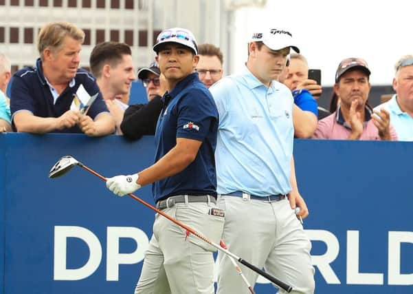 Kurt Kityama and Bob MacIntyre during the first day of the DP World Tour Championship in Dubai. Picture: Andrew Redington/Getty Images