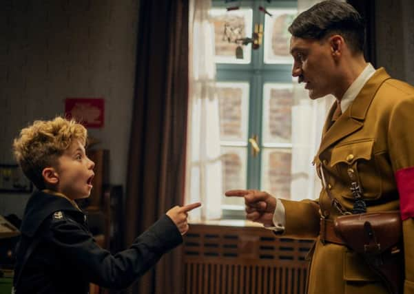 Roman Griffin Davis and Taika Waititi in Jojo Rabbit PIC: Kimberley French. © 2019 Twentieth Century Fox Film Corporation