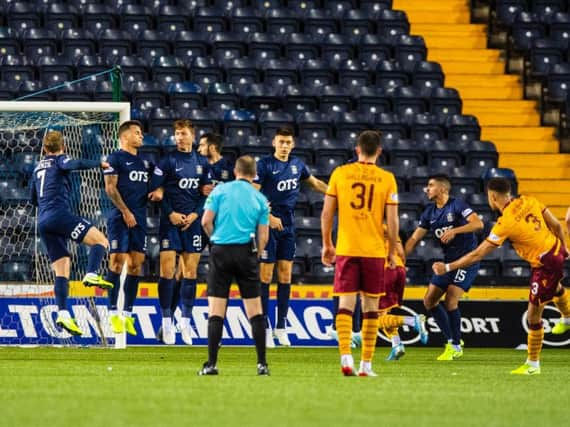 Jake Carroll puts Motherwell ahead.