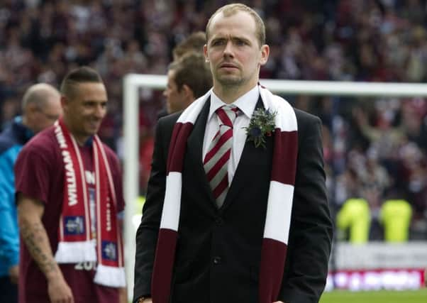 Jamie Hamill joins in the celebrations after Hearts' 5-1 win over Hibs in the 2012 Scottish Cup final