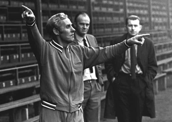 Bobby Brown in full flow, watched by Ernie Walker and Willie Waddell. Picture: SNS