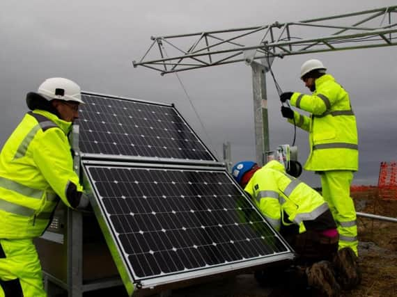 Solar panels and a pole with MBPs camera equipment being erected. Picture: contributed.