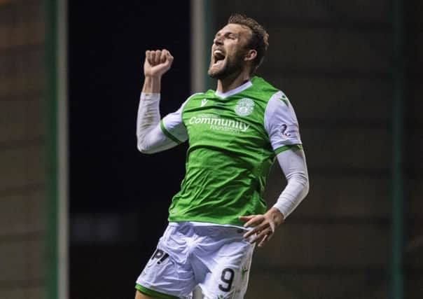 Christian Doidge celebrates scoring his second goal in Hibernians 4-2 defeat of Dundee United. Picture: SNS