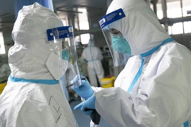 Medical workers in the Zhongnan Hospital of Wuhan University. Picture: AP