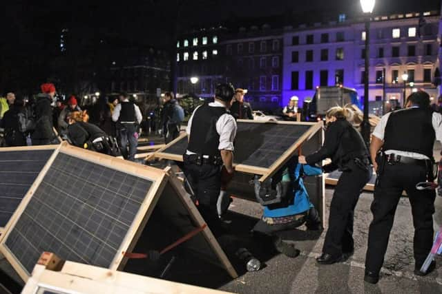 Greenpeace of activists at the headquarters of BP in St James' Square, London. Picture: Greenpeace.